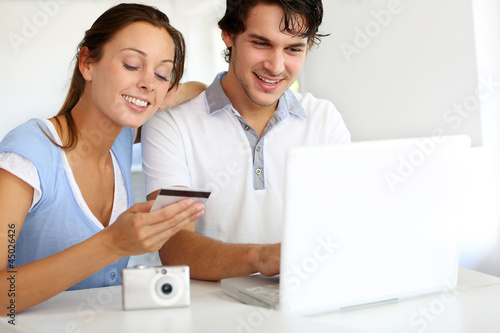 Photo: Couple having their pictures developed on internet Couple having their pictures developed on internet