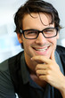 Portrait of handsome young man with glasses