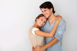 Cheerful young couple standing on white background, isolated
