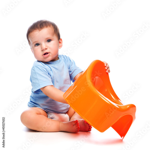 Photo: Little boy holding potty Little boy holding potty