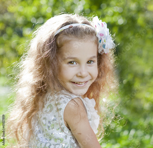 Photo: portrait of a cute young girl portrait of a cute young girl