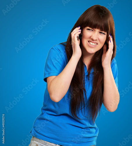 Photo: Woman Disturbed By Noise Woman Disturbed By Noise