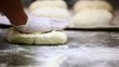 Baker kneading dough