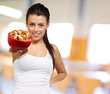 Young woman holding a cereal bowl