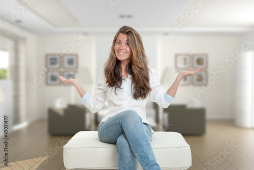 Photo: Young woman at home Young woman at home