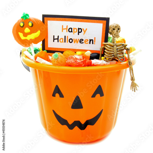 Photo: Halloween candy holder full of candy and Happy Halloween tag Halloween candy holder full of candy and Happy Halloween tag