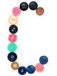 The alphabet from buttons for sewing.