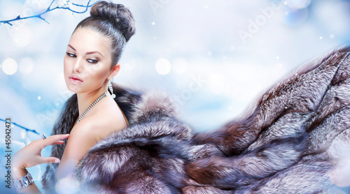Photo: Winter Woman in Luxury Fur Coat Winter Woman in Luxury Fur Coat