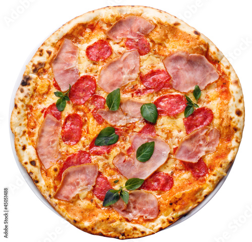 Photo: round pizza with ham, tomatoes and greens round pizza with ham, tomatoes and greens