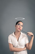 Photo: Sexy brunette woman holding a knife with halo Sexy brunette woman holding a knife with halo