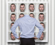 Young man choosing which face expression to wear