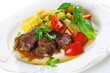 Photo: Traditional goulash or beef stew with vegetables and salad of fr Traditional goulash or beef stew with vegetables and salad of fr