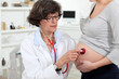 Foto: Pregnant woman with doctor Pregnant woman with doctor