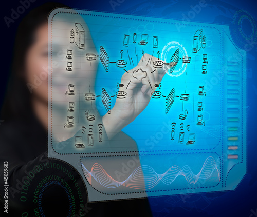 Photo: business woman drawing a security plan for a firewall system business woman drawing a security plan for a firewall system