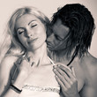 Romantic couple at the beach. Sepia tone.