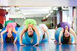 Photo: Gym fitness women - Training and workout Gym fitness women - Training and workout