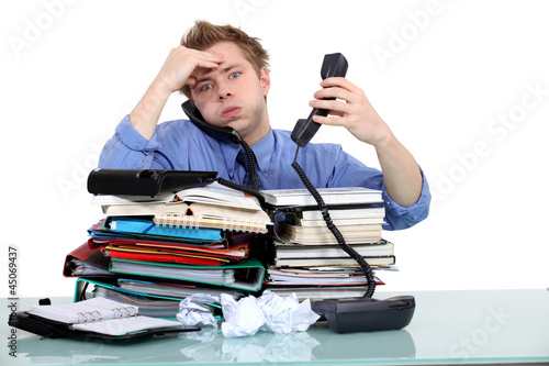 Photo: Overworked civil servant Overworked civil servant