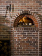 "USA, Utah, Orem, logs by brick fireplace"