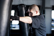 "USA Utah, American Fork, Boxer punching boxing bag"