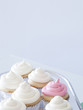 "Cupcakes with frosting on silver tray, close-up, copy space"