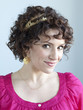 "Young woman smiling, portrait, studio shot"