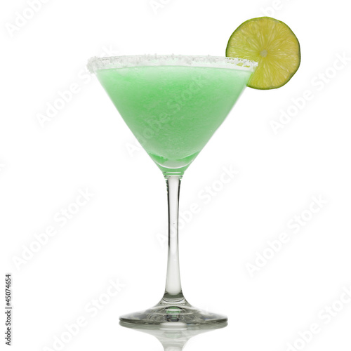 Photo: Green cocktail with lime on white background Green cocktail with lime on white background