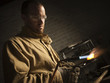 "USA, Utah, Orem, male welder using blowtorch in workshop"