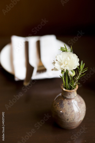 Photo: "Orem, Utah, USA, little vase with white flower" "Orem, Utah, USA, little vase with white flower"