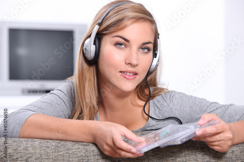 Photo: Teenage girl listening to music Teenage girl listening to music