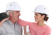 An electrician and his apprentice.