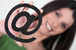 Woman showing at sign