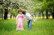 Photo: Children kissing in meadow Children kissing in meadow