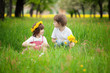 Young boy and girl in grass