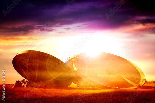 Photo: radar dishes sun flare radar dishes sun flare