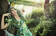 portrait of a beauty woman over nature background