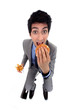 A businessman devoring a burger.