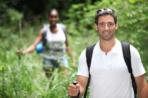 Photo: Couple hiking in the wilderness Couple hiking in the wilderness