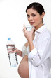 Pregnant woman drinking water