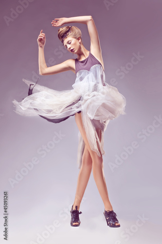 Photo: Portrait of elegant woman in retro antique era dress. Carnival Portrait of elegant woman in retro antique era dress. Carnival
