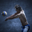 Photo: Studio shot of volleyball player playing Studio shot of volleyball player playing