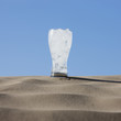 "USA, Utah, Little Sahara, glass of ice cold water in desert"