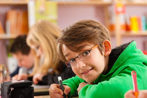 Photo: Education - Pupils at school doing homework Education - Pupils at school doing homework
