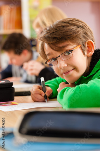 Photo: Education - Pupils at school doing homework Education - Pupils at school doing homework