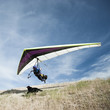 "USA, Utah, Lehi, man taking off in hang-glider"