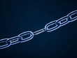 Chain linked with paper clip against blue background