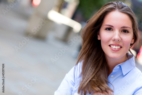 Photo: Casual woman smiling Casual woman smiling