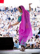 Photo : "USA, Utah, Spanish Fork, mid adult dancer in traditional clothing performing on stage" "USA, Utah, Spanish Fork, mid adult dancer in traditional clothing performing on stage"