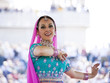 Photo : "USA, Utah, Spanish Fork, portrait of mid adult dancer in traditional clothing performing on stage" "USA, Utah, Spanish Fork, portrait of mid adult dancer in traditional clothing performing on stage"
