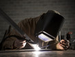 "USA, Utah, Orem, welder using torch"