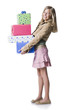 "Girl (10--11) holding a stack of presents, portrait"